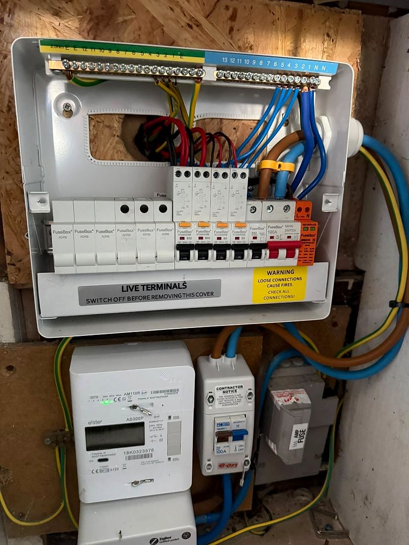 The new 10-way RCBO board with surge protection, fitted and labelled in the same spot