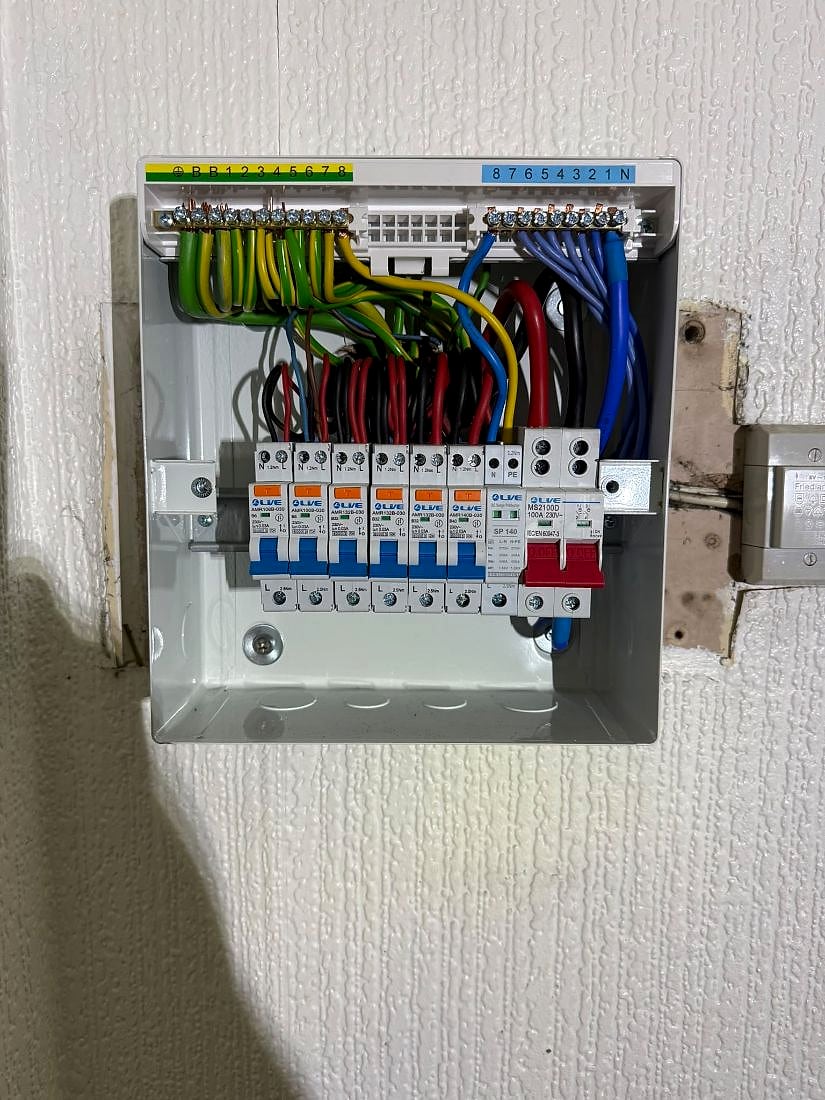 A consumer unit fitted by Wired & Certified, conductors dressed and labelled
