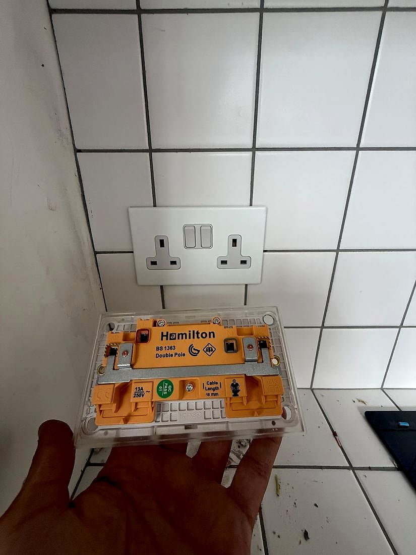 A socket being tested during fault finding